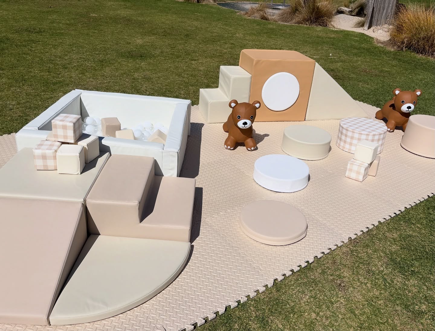 Neutral cream and beige outdoor soft play collective with ball pit and teddy bears in the Barossa